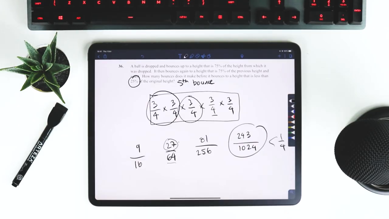 Tablet displaying maths problem with handwritten notes