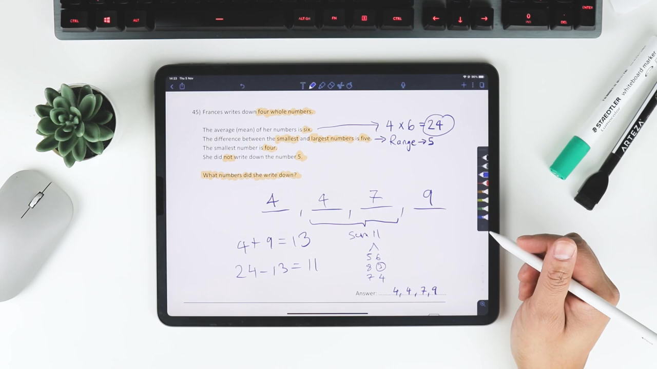 iPad displaying maths problems and solutions.